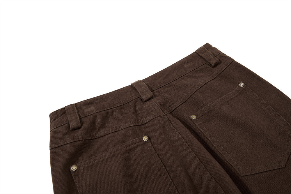 Brown pants with buttons on a white background