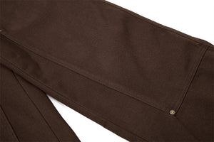 Brown fabric with a button on a white background