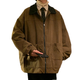 Style yourself in this oversized green corduroy jacket with a contrasting brown collar to add a vintage, textured edge to your daily streetwear rotation.