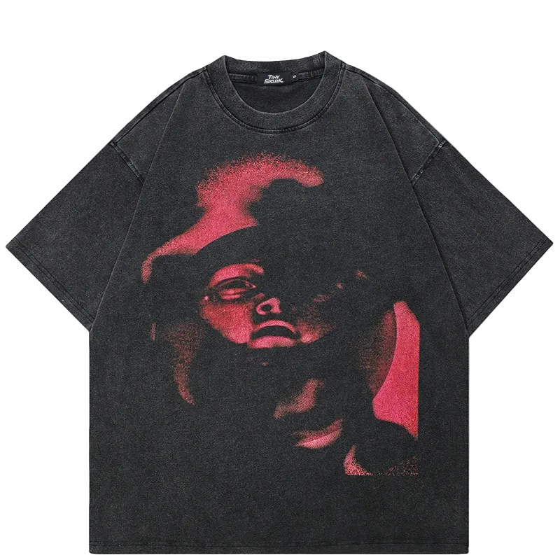 Black t-shirt with red graphic design on a white background