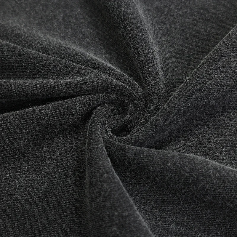 Close-up of dark gray fabric with a textured pattern