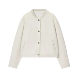 Beige jacket with button details on a white background