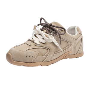 Beige sneaker with white laces on a white background