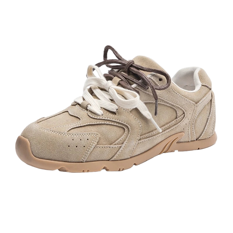 Beige sneaker with white laces on a white background