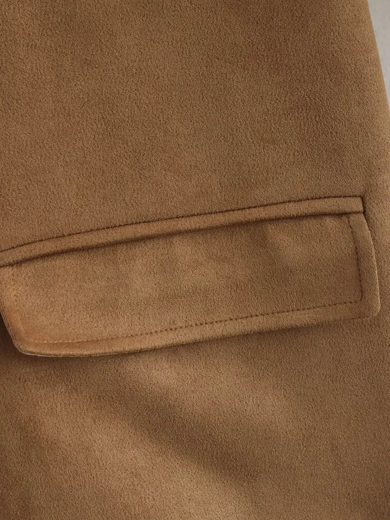 Close-up of a brown fabric pocket on a garment