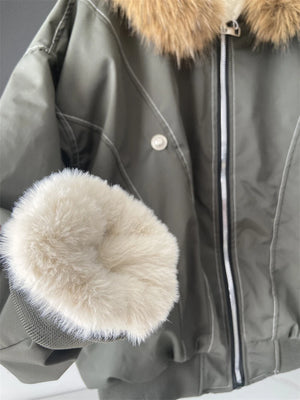 Stay warm and stylish in this oversized streetwear parka, featuring a plush faux fur lining and hood for the ultimate cozy winter look.