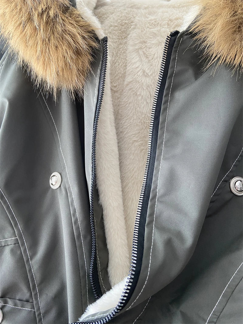Stay warm and stylish in this oversized streetwear parka, featuring a plush faux fur lining and hood for the ultimate cozy winter look.