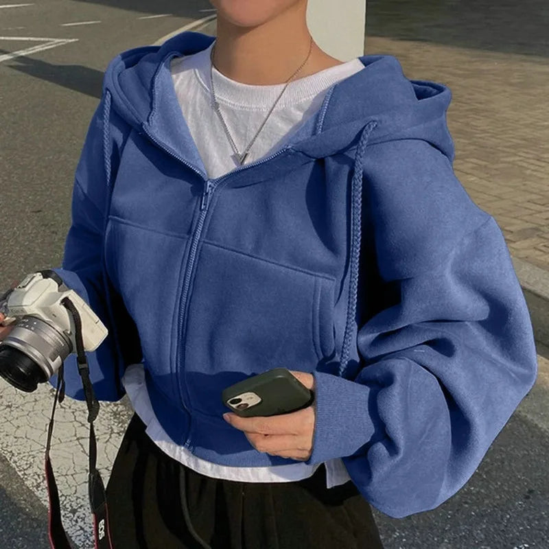 Level up your layers with this ultra-comfy oversized zip-up hoodie featuring a slouchy drop-shoulder fit for the perfect streetwear look.