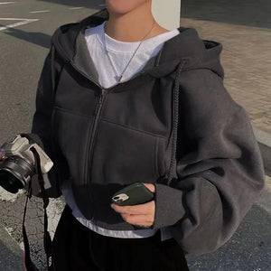 Level up your layers with this ultra-comfy oversized zip-up hoodie featuring a slouchy drop-shoulder fit for the perfect streetwear look.