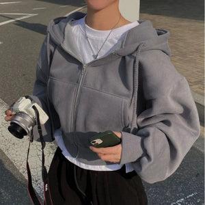 Level up your layers with this ultra-comfy oversized zip-up hoodie featuring a slouchy drop-shoulder fit for the perfect streetwear look.